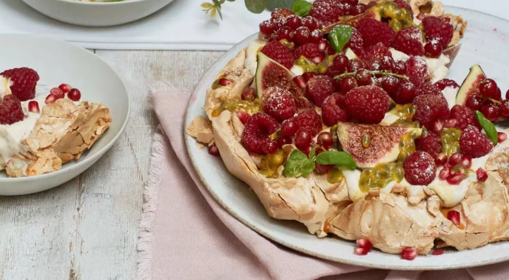 Gold-dusted mixed berry pavlova recipe