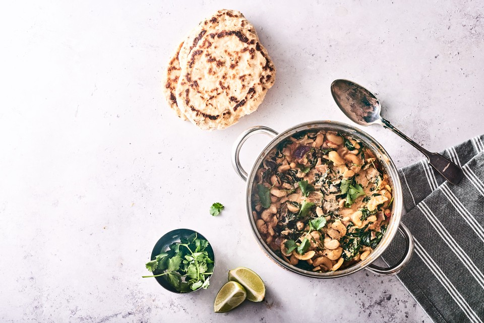 Vegetarian cashew and spinach curry recipe with speedy yoghurt flatbreads