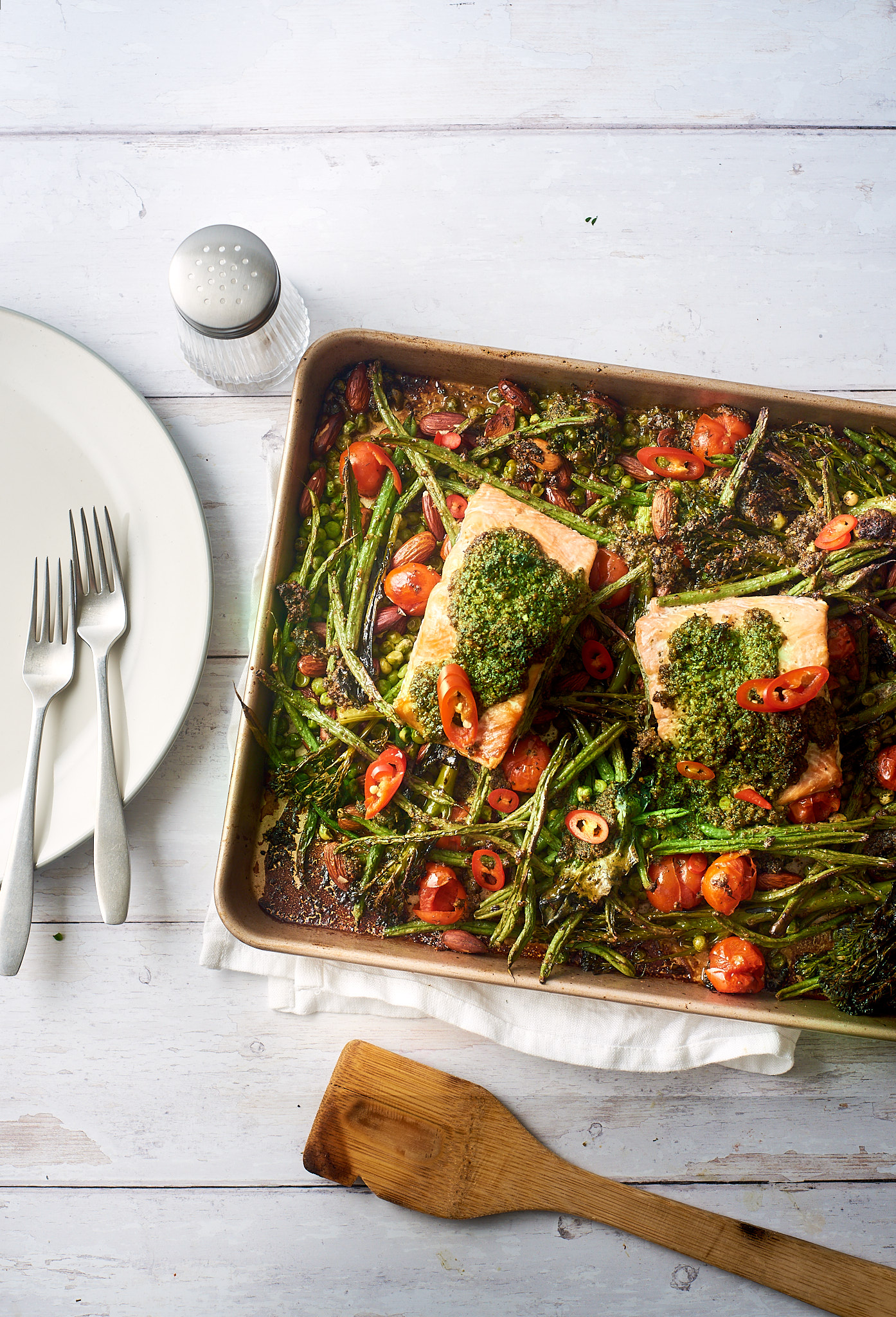 Salmon, greens and pesto traybake recipe
